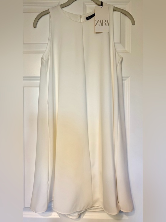 Zara Dresses & Skirts - Zara White Flowy Knee-Length Sleeveless Dress with A-Line Silhouette